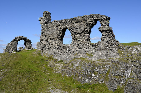 卡斯特尔迪纳斯麸皮卡斯特利迪纳斯布兰城堡乡村石头灰色废墟麸皮堡垒蓝色背景