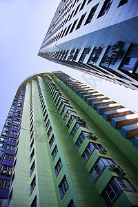 高楼建筑地面蓝色刮刀公司天际控制板城市市中心天空建造背景图片