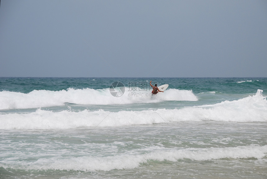顺浮线直线肌肉运动员风险青年速度蓝色运动闲暇海洋海滩图片