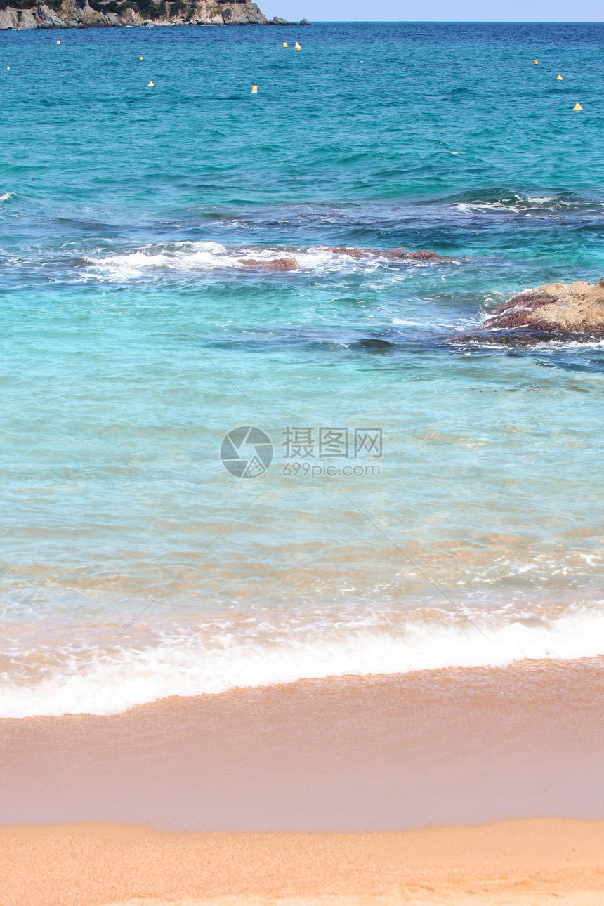 海滩西班牙假期季节海岸线海洋热带晴天海岸阳光射线旅游图片