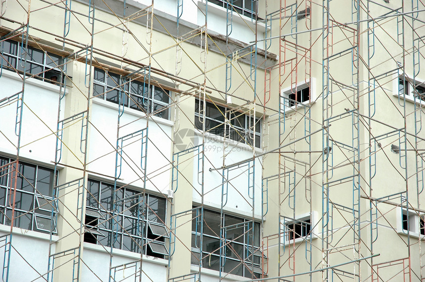 正在建造的建筑窗户房子工程橙子头盔工作建筑学加载蓝色工人图片