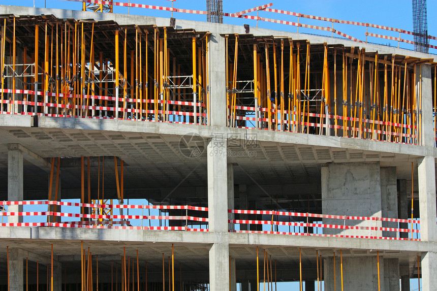 建筑工地建筑物格子金属建筑学脚手架生长起重机工业城市建造图片