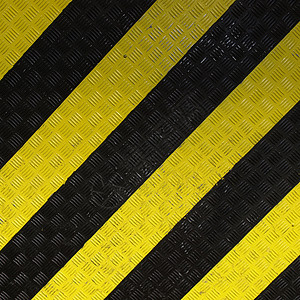 钻石钢工业黑色条纹材料床单金属灰色黄色背景图片
