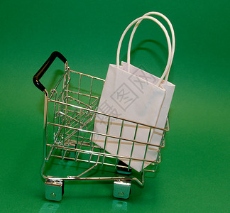 购物车购物店铺白色绿色背景图片