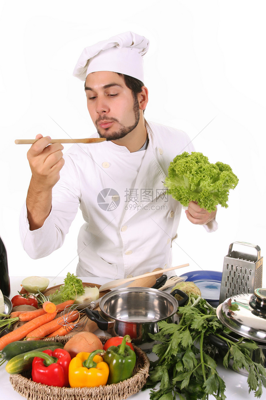 准备午餐的年轻厨师气概展示乐趣职业男人烹饪男子微笑白色男性图片