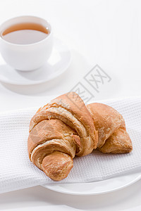 茶叶卷甜点早餐食物杯子羊角面包背景图片