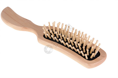 梳子木头白色卫生刷子乐器按摩头发发刷理发师工具背景图片