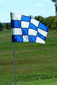 蓝色和白面花绿洞旗背景图片