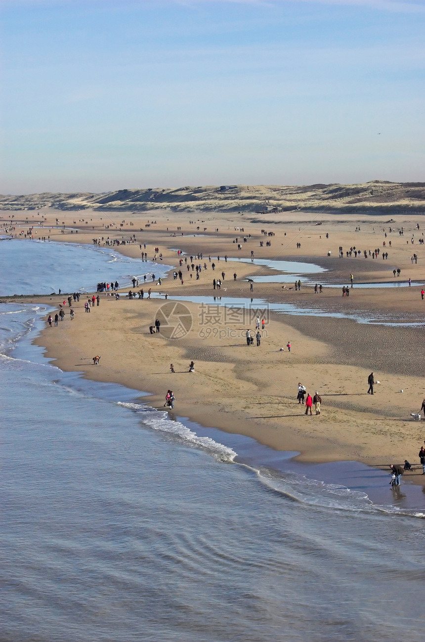海滩晴天团体人群天气海岸线支撑假期分数荒野风景图片