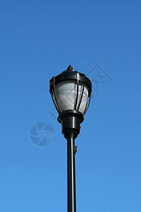 街灯路灯金属灯柱灯笼蓝色天空玻璃背景图片