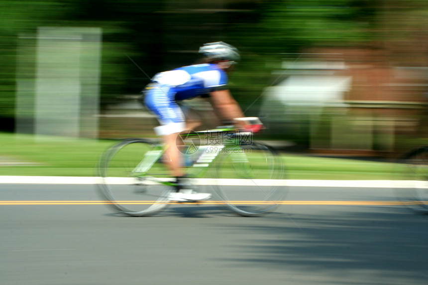 模糊运动自行车赛街道竞争活动旅游速度男人行动运动自行车运动员图片
