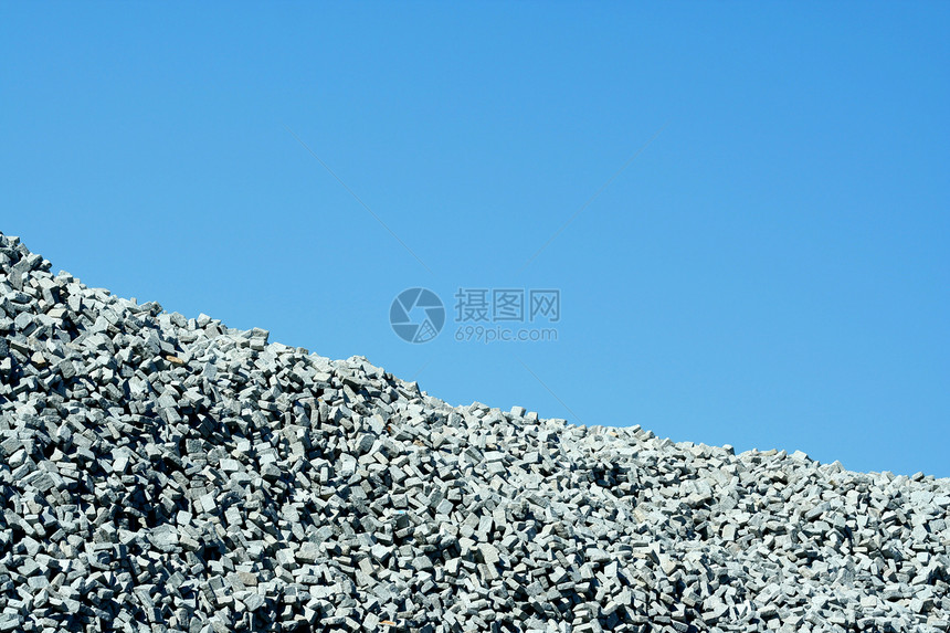 蓝色天空的花岗岩石堆石头岩石材料图片