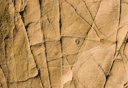 沙石质砂岩裂缝巨石岩石背景图片