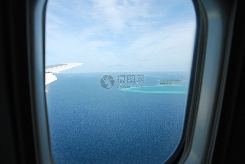 飞机对马尔代夫群岛的观察场景地平线翅膀气氛运输航班航程旅行天空航空图片