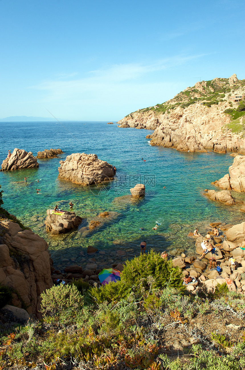 意大利撒丁岛假期红色海洋天堂蓝色天空岩石海岸图片