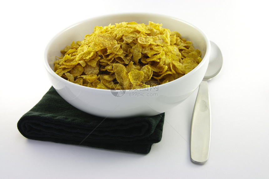 玉米片和勺子在碗中午餐饮食小吃厨房薄片玉米食物餐巾营养谷物图片