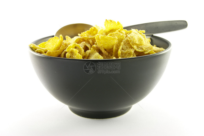 杯子里的玉米片勺子早餐活力食物牛奶黄色谷物玉米粮食薄片图片