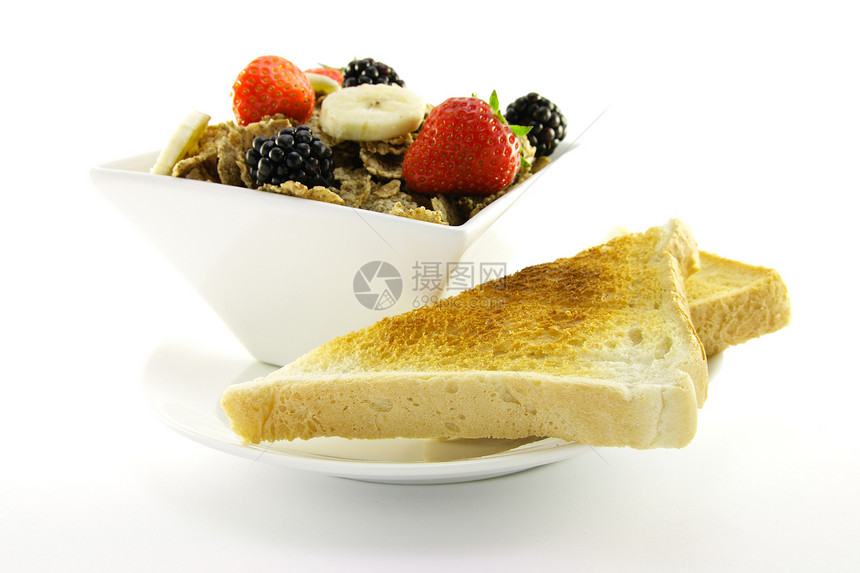 白碗中的布兰花薄片宏观福利早餐牛奶麸片饮食纤维食物谷物图片