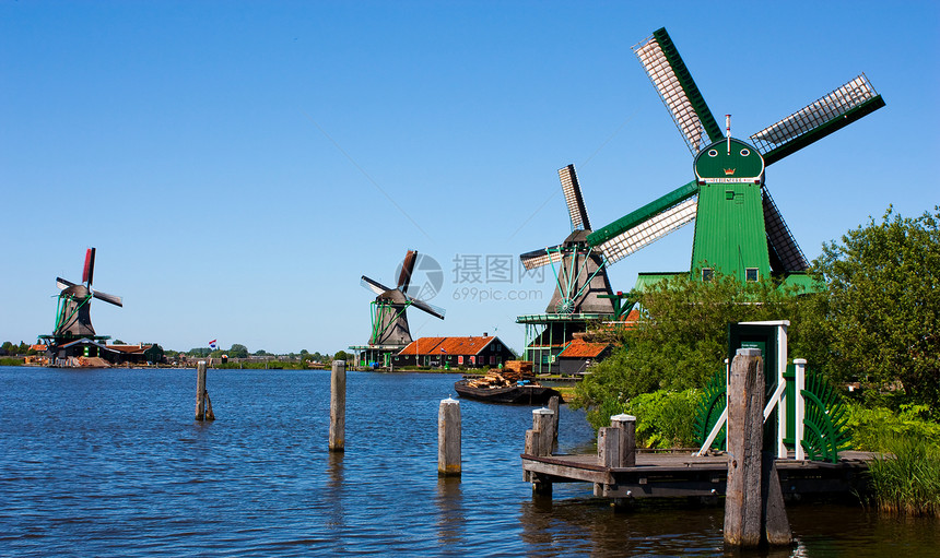 荷兰的磨坊天空供电乡村文化农村蓝色历史风车力量溪流图片