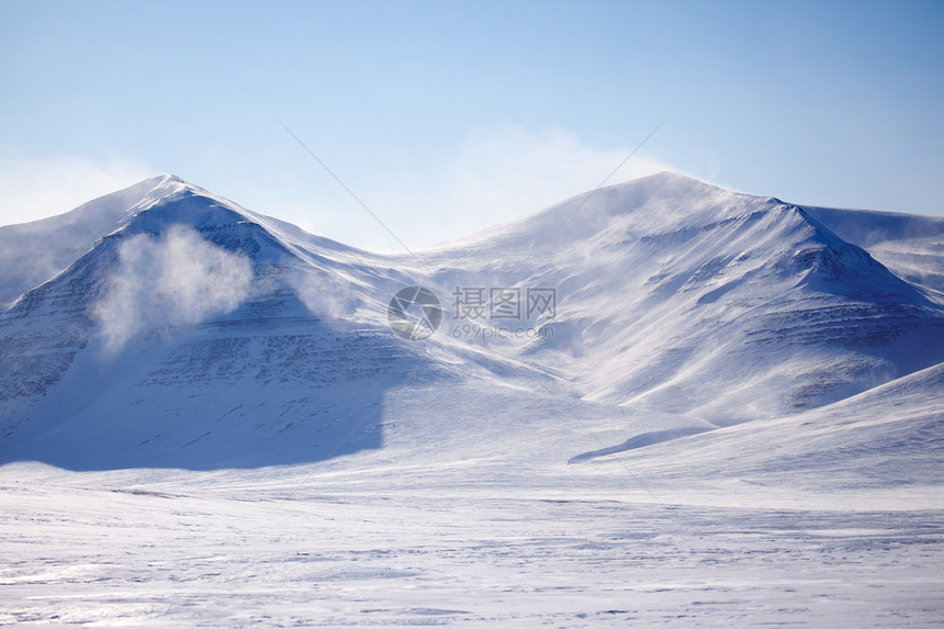 雪覆盖山旅行场景旅游地形蓝色气候环境荒野全景冻结图片