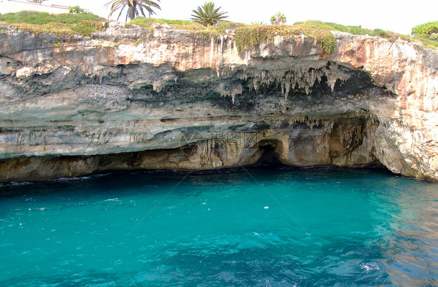 波多克里斯托附近海盗洞穴天空假期石笋旅行海滩太阳蓝色石洞钟乳海岸图片