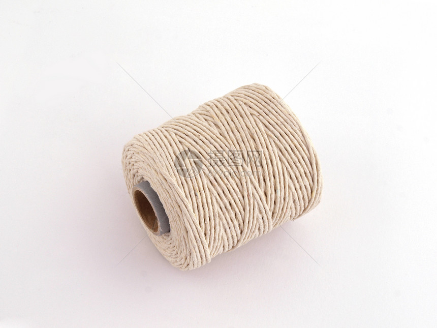 字符串或麻线的球细绳主轴绳索螺旋绑定线圈绑扎力量白色棉布图片
