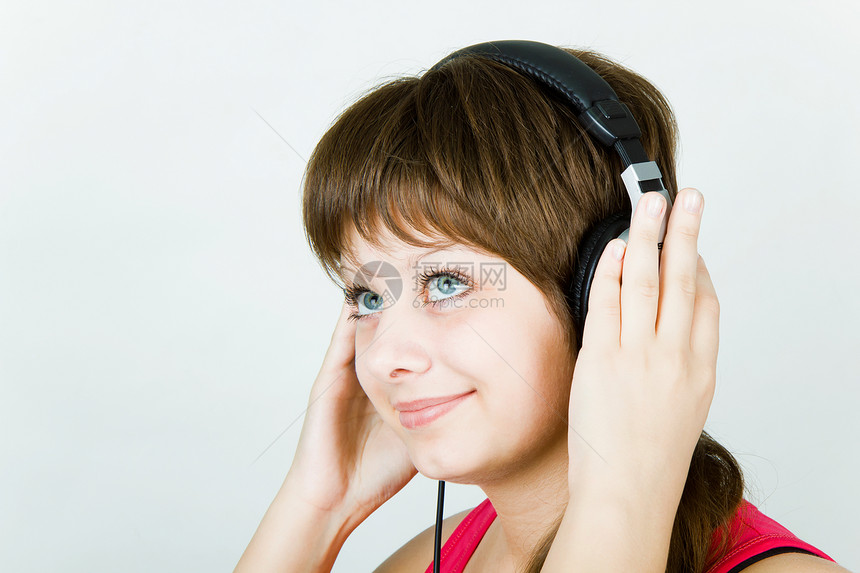 女孩音乐情人肖像电子产品眼睛音乐播放器享受扇子蓝色文化记录工作室耳机图片