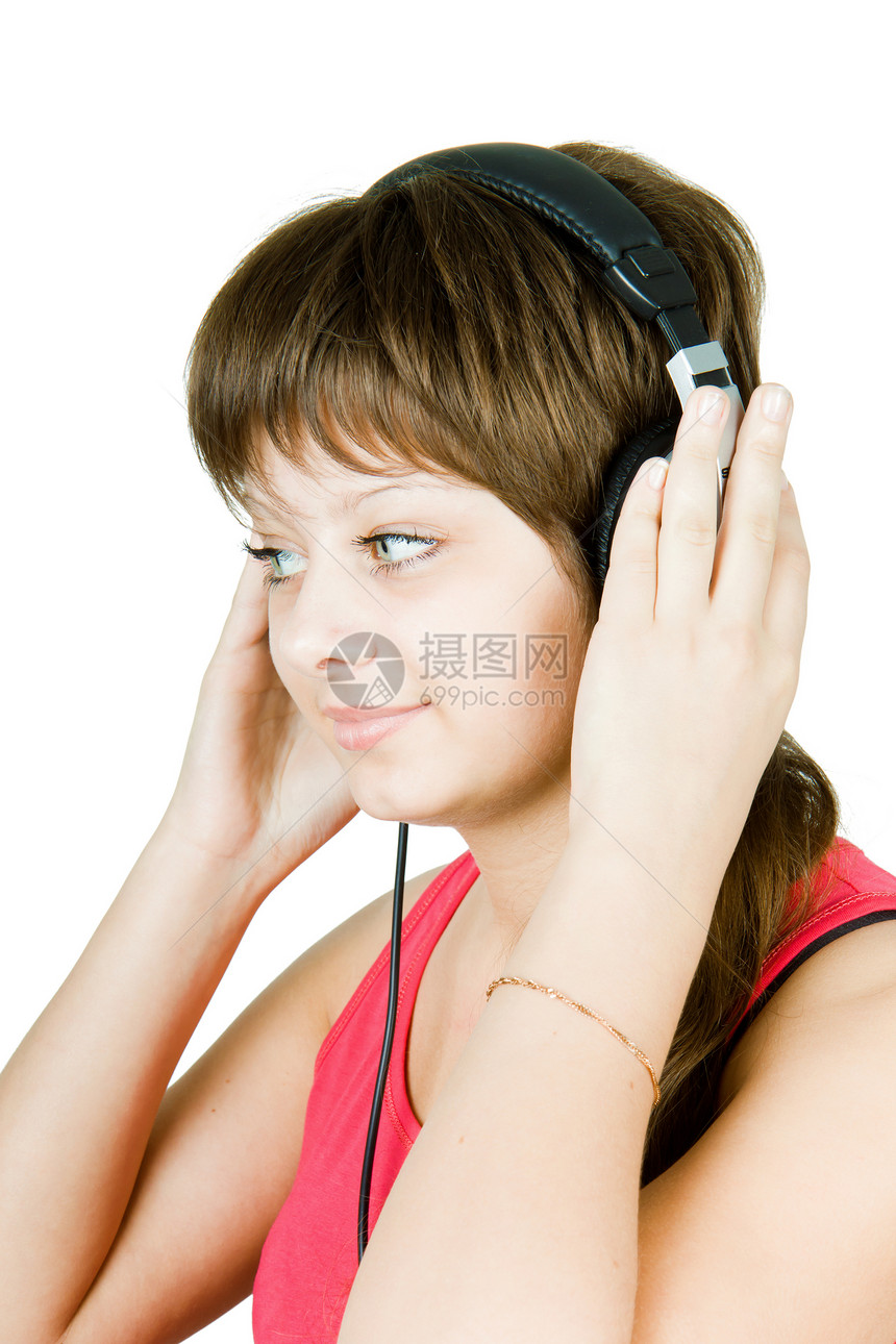 戴耳机的少女电子产品蓝色记录岩石享受乐趣扇子青少年女性女孩图片
