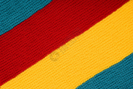 羊毛针线活针织红色黄色条纹绿色材料背景图片