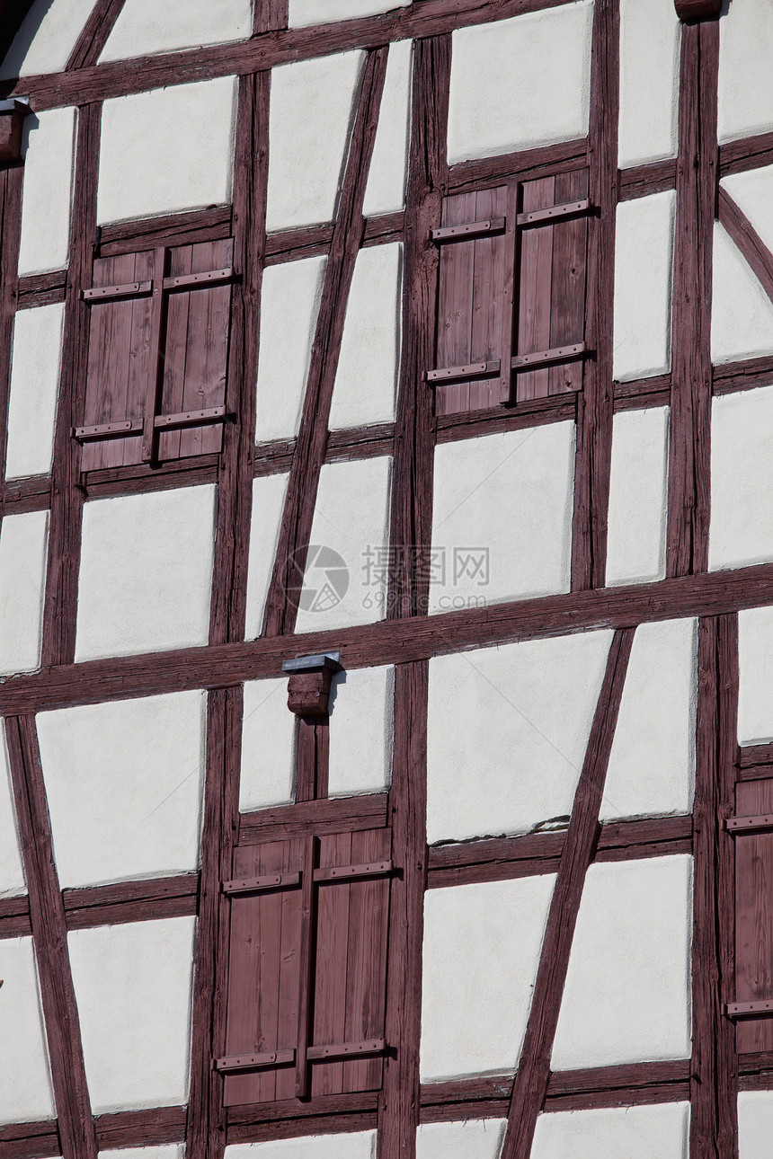 旧框架房屋的详情建筑木结构白色骨骼棕色建筑学窗户房子木头图片