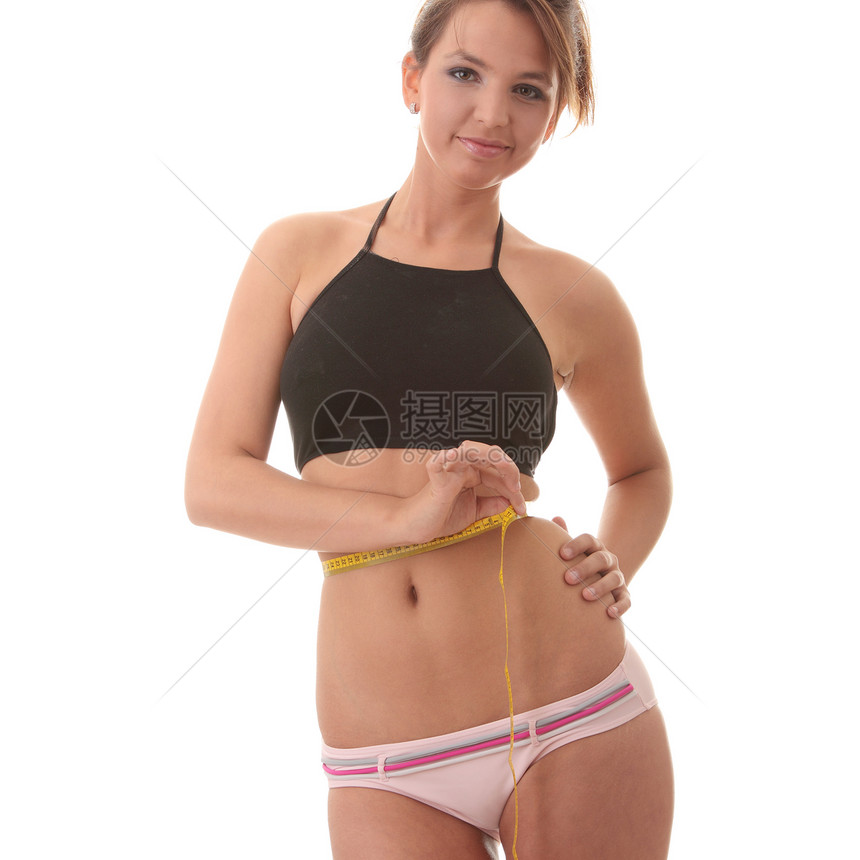 测量腰内衣磁带肥胖蓝色暴饮暴食衣服调子数字腰部女孩图片