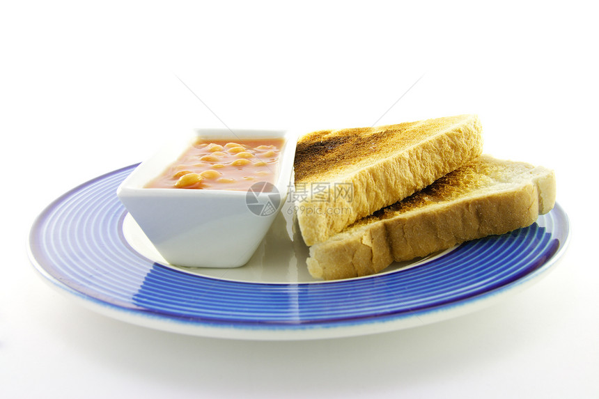 餐桌上的烹饪早餐物品用餐服务盘子餐厅生活午餐食物油炸豆子图片