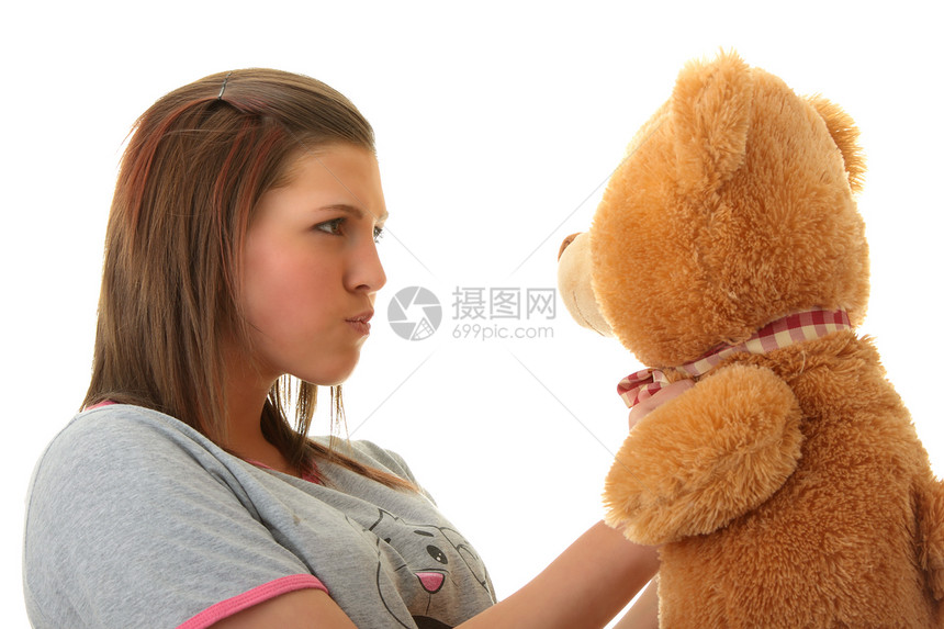 带着泰迪熊的漂亮少年女士动物成人玩具快乐女性喜悦安全青年蓝色图片