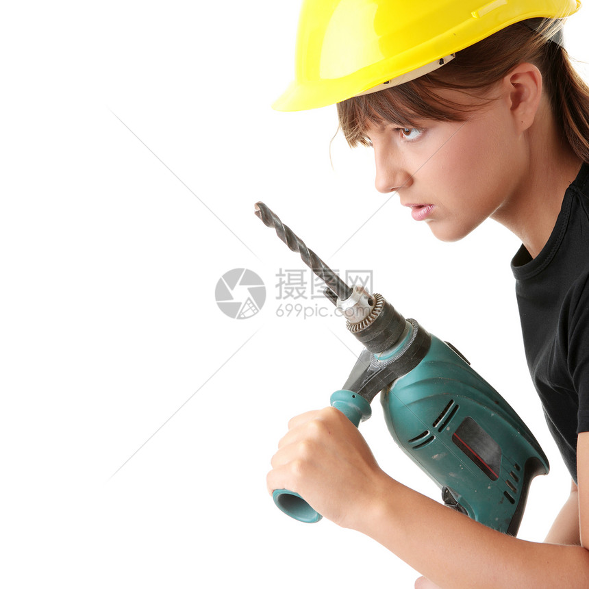 配备钻井机的年轻女性建筑工男人维修女士帽子承包商女孩工作钻头工具建筑图片