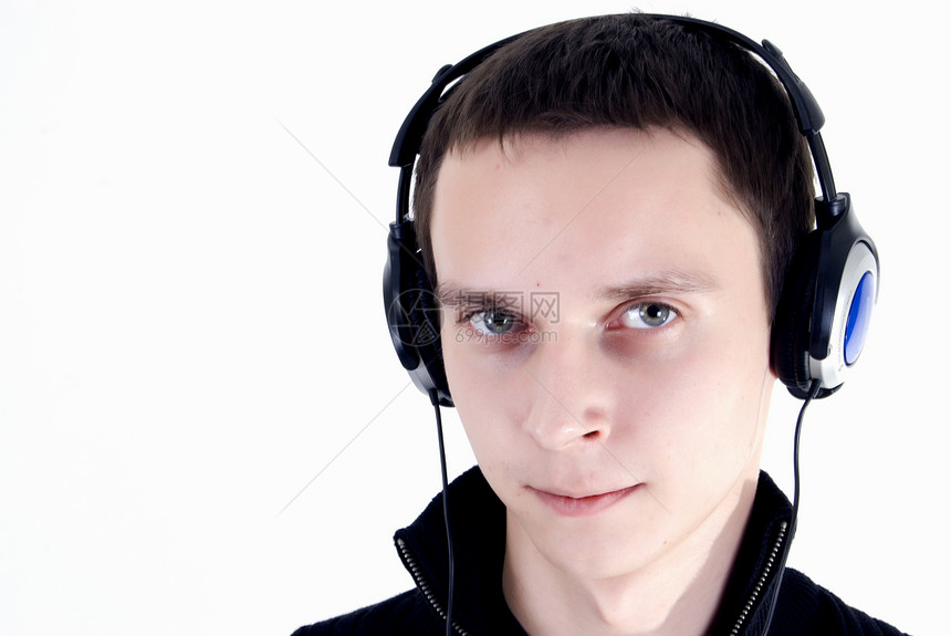 持耳机的年轻人闲暇收音机男性享受记录韵律音乐播放器流行音乐玩家娱乐图片