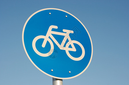 自行车蓝色交通运动车道圆形安全路标天空运输背景图片