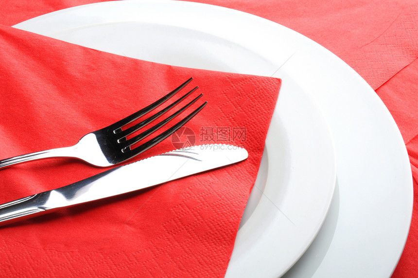 叉刀刀桌子餐厅红色午餐银器盘子餐具食物图片