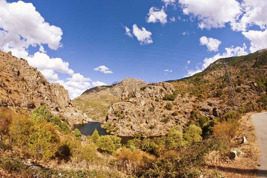 科西卡山区和山谷石头女孩远足旅游建筑悬崖太阳橙子全景房子图片