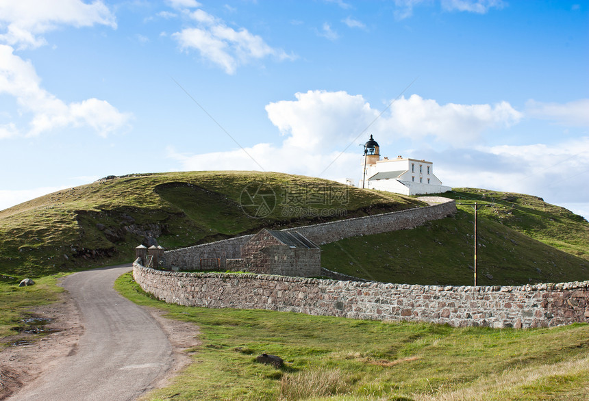 苏格兰灯塔房子小岛海岸白色岩石高地地标海岸线历史性导航图片