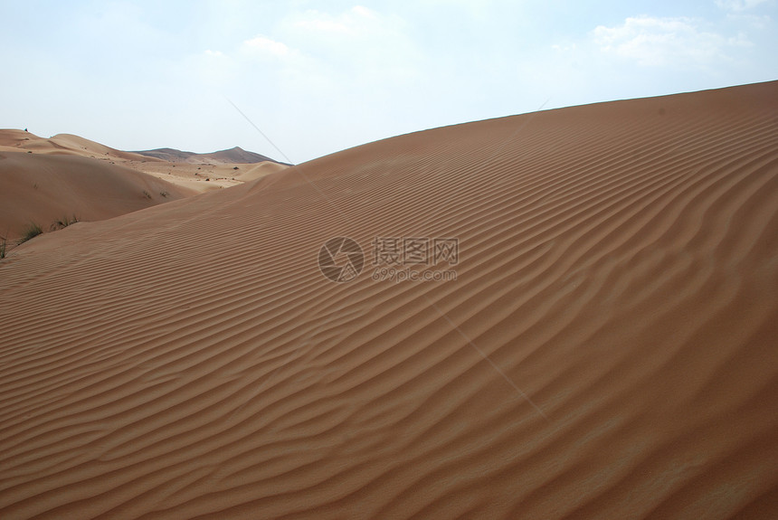 沙漠丘陵日落黄色沙丘橙子爬坡波纹旅行水平图片