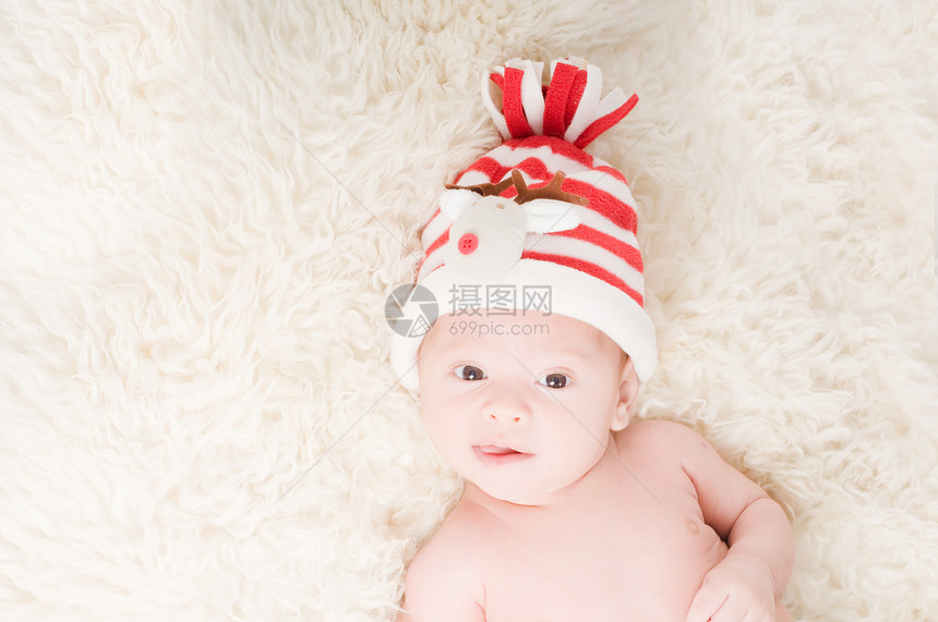 戴着礼服帽的新生儿新生毛皮帽子条纹红色婴儿材料男生孩子童年图片