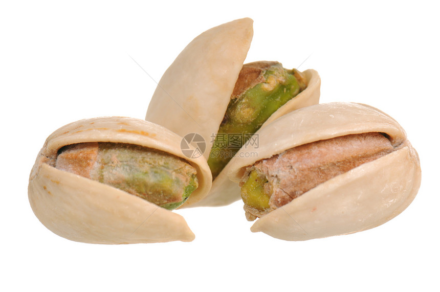 近视中的Pistachios水果开心果绿色宏观白色食物坚果团体小吃盐渍图片