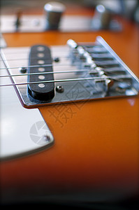 电吉他背景白色电线棕色金属木头塑料乐器背景图片