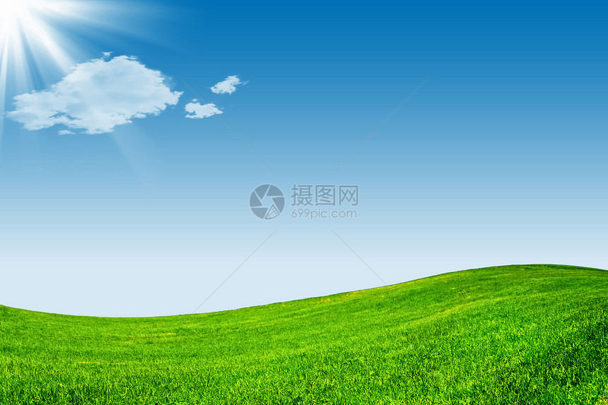 蓝天空和绿草地图片