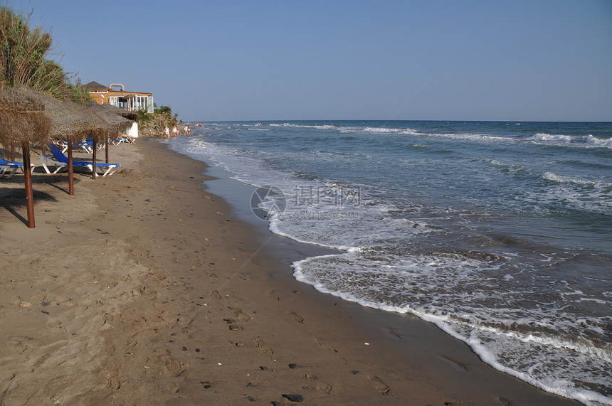 海滩场景天空假期海浪风景蓝色支撑旅行海岸线扶手椅图片