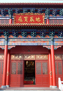 宗教建筑建设旅行建造庙门红色叶子概念背景图片