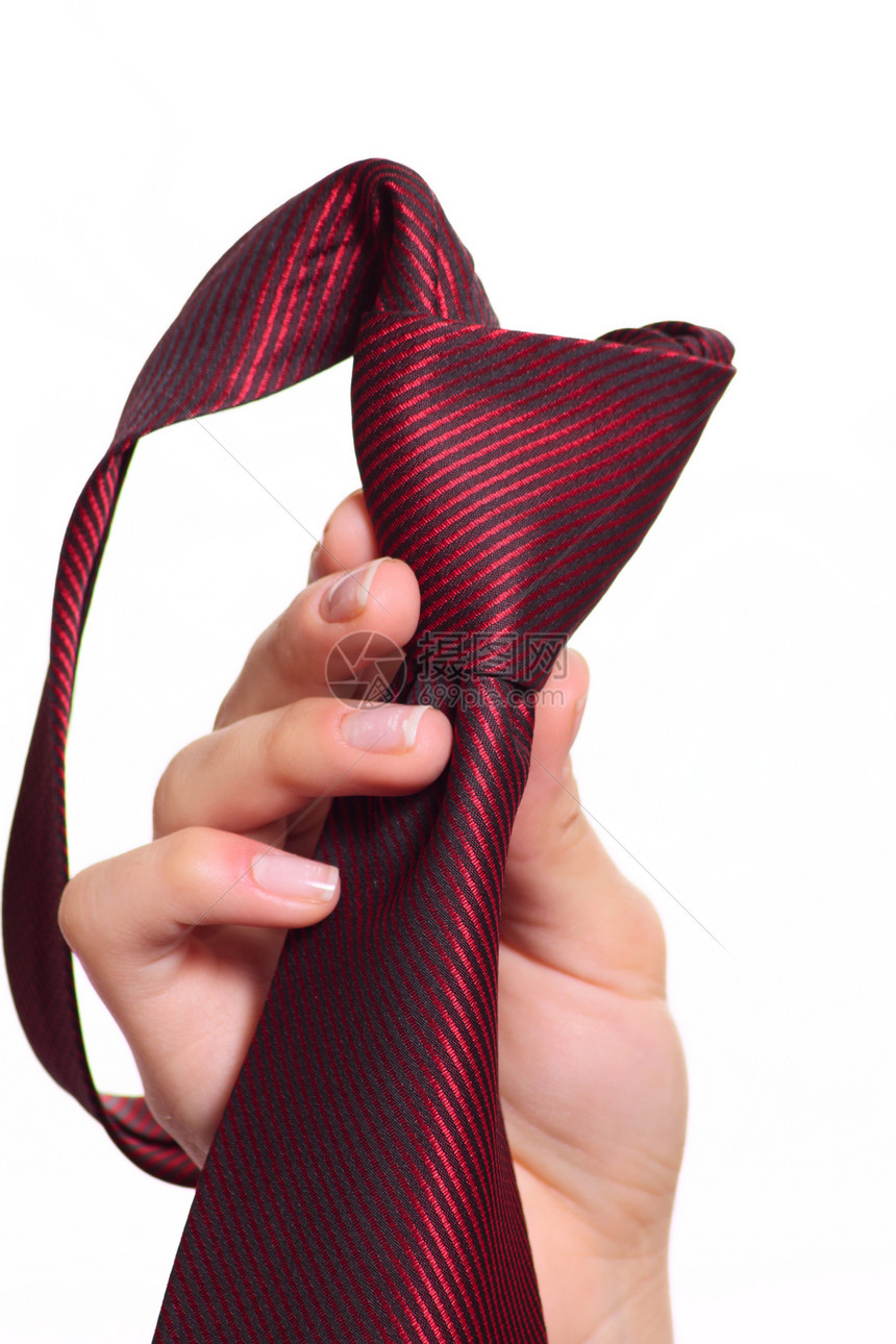 女性手握红色条纹领带和紧结图片