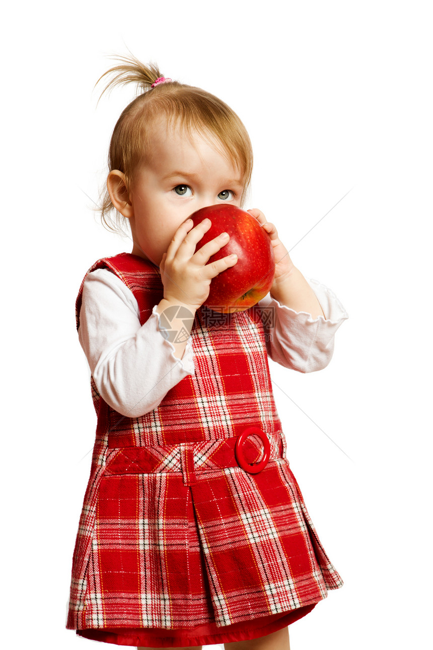 女孩吃苹果食物孩子微笑女儿衬衫卷曲工作室享受童年生长图片