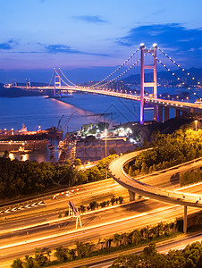 车水马轮香港清马桥夜幕的夜间场景曲线汽车景观地标运输城市辉光穿越运动天空背景