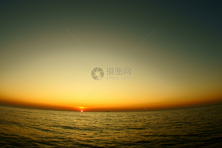 日落旅游海岸阳光假期季节晴天反射日光天空热带图片
